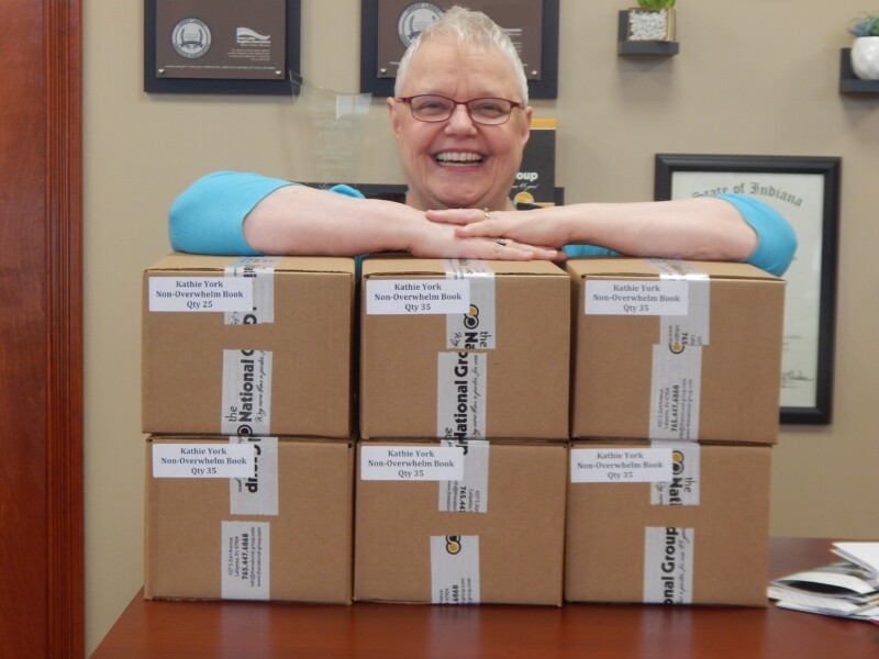 Kathie and her 6 boxes of books!